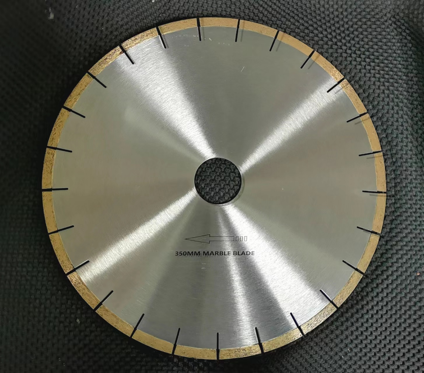 A SENLY 350 mm marble cutting blade with a silver steel core and diamond cutting segments